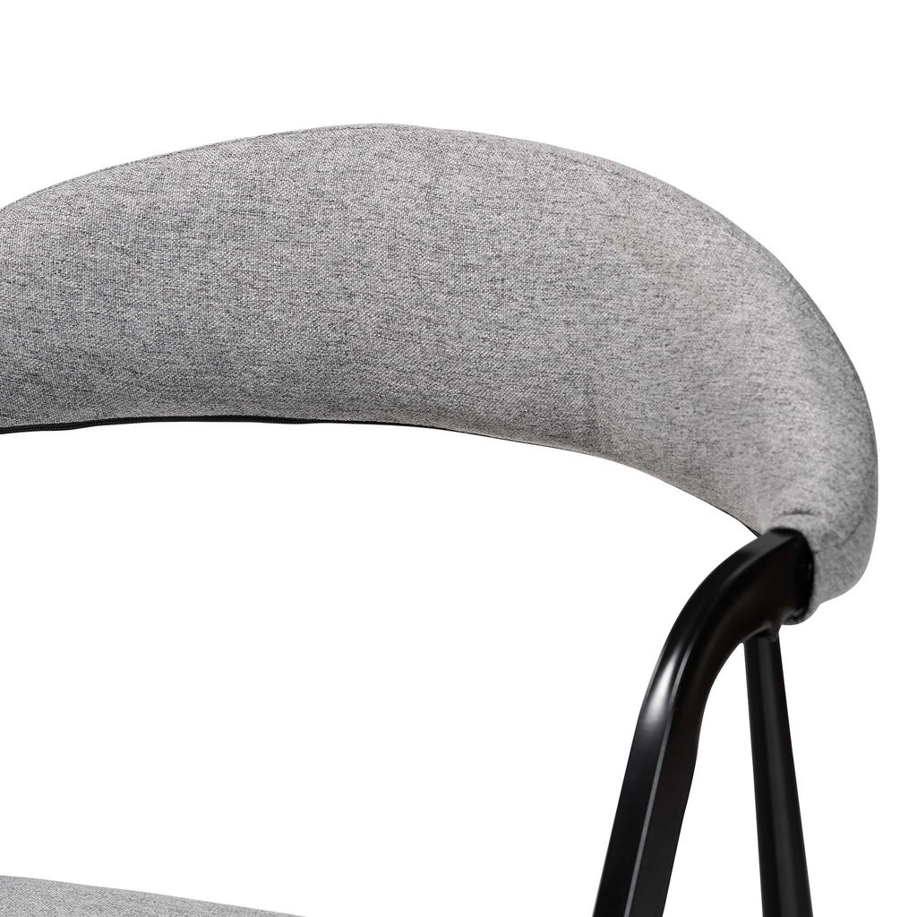 Close-up of grey fabric texture on chair backrest
