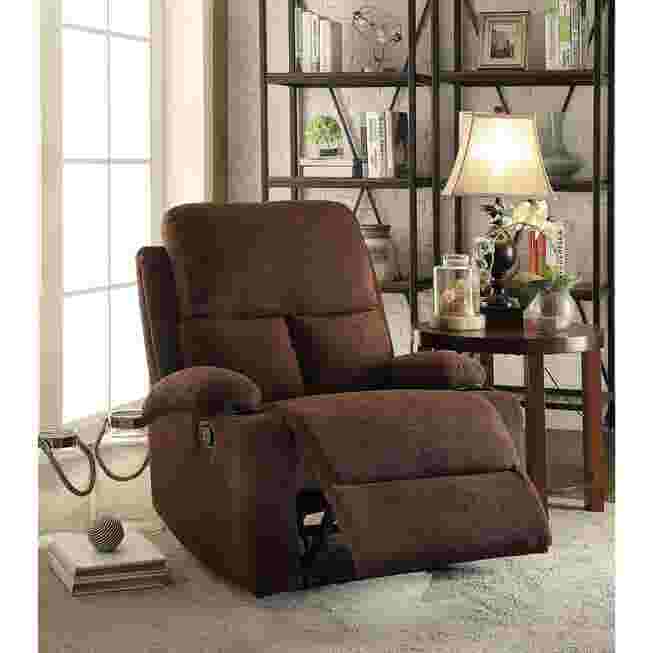 Brown recliner in living room with lamp and shelf