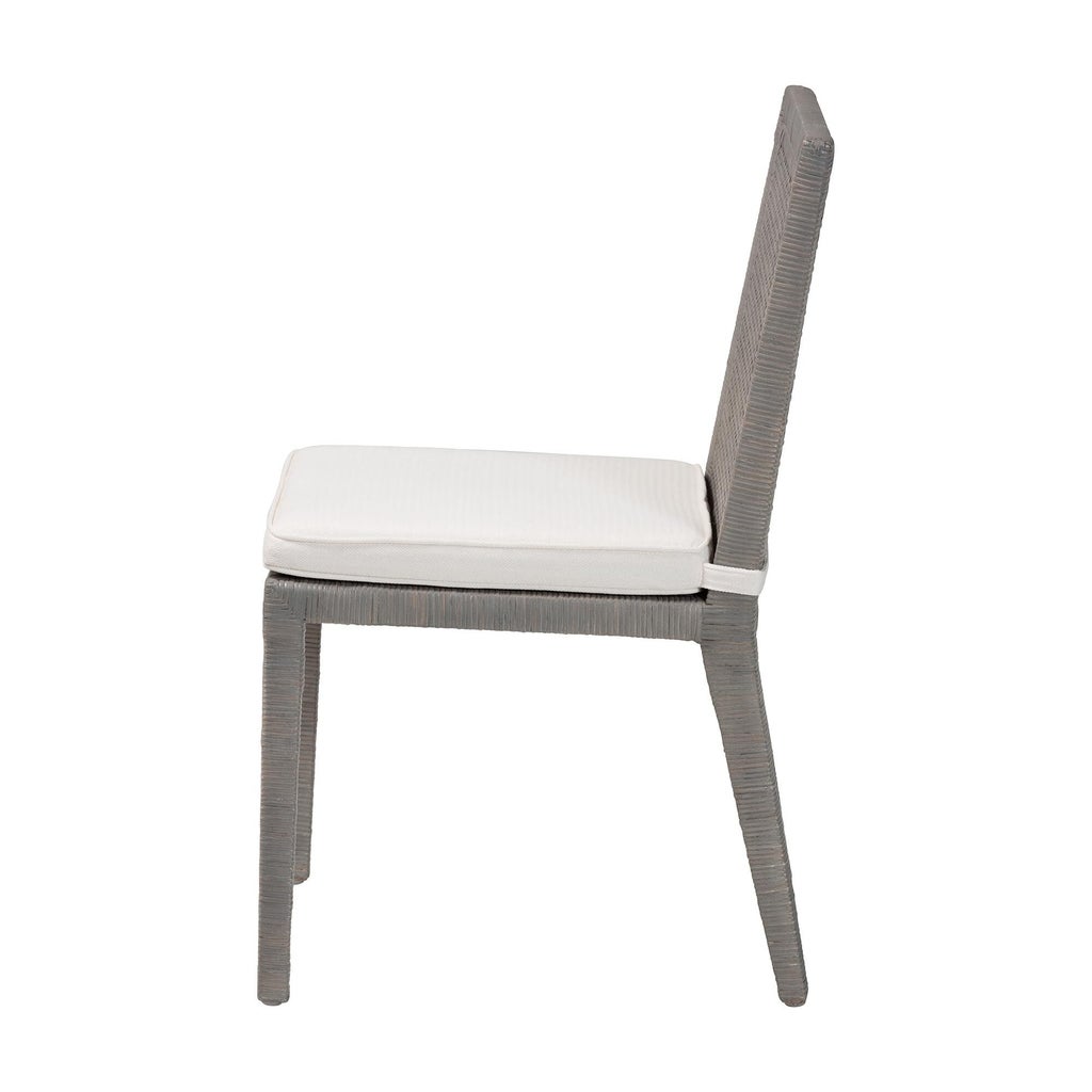 Side view of grey woven dining chair with white cushion