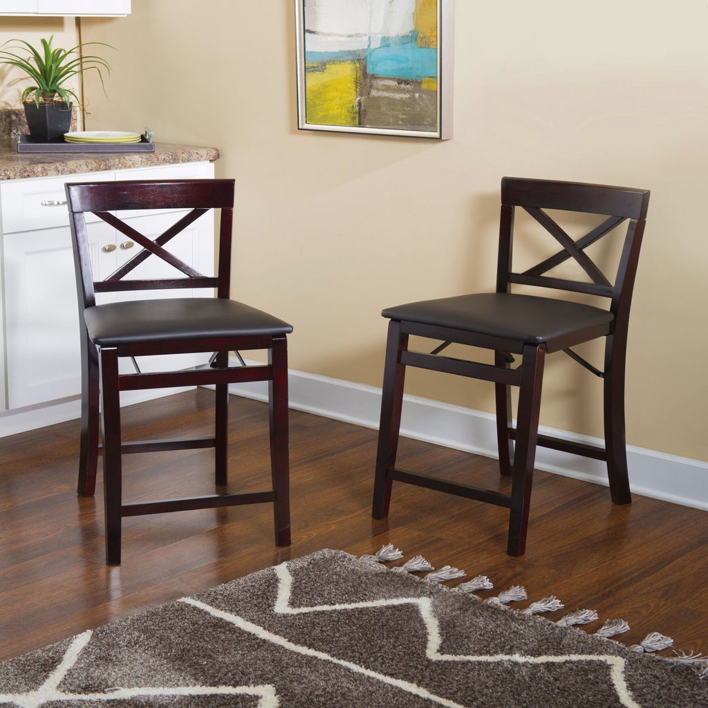 Two Triena X back folding counter bar stools placed in a room