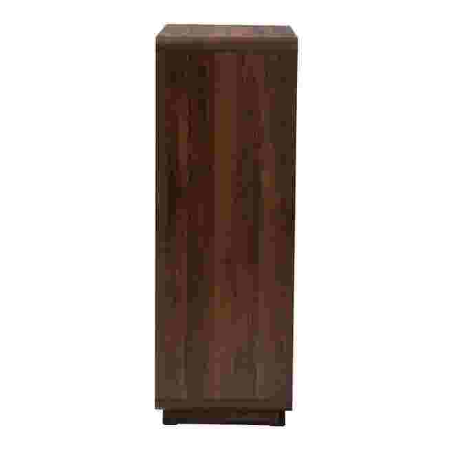 A side view of a dark wood chest with a rattan drawer front.