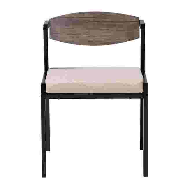 a dining chair with a fabric seat and backrest and metal frame