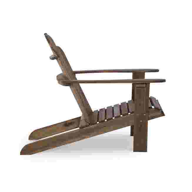 Side view of a wooden Adirondack chair.