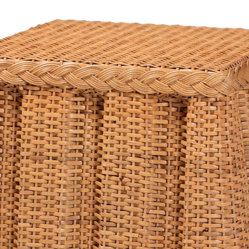 Close-up of woven rattan pattern on the end table top and edge