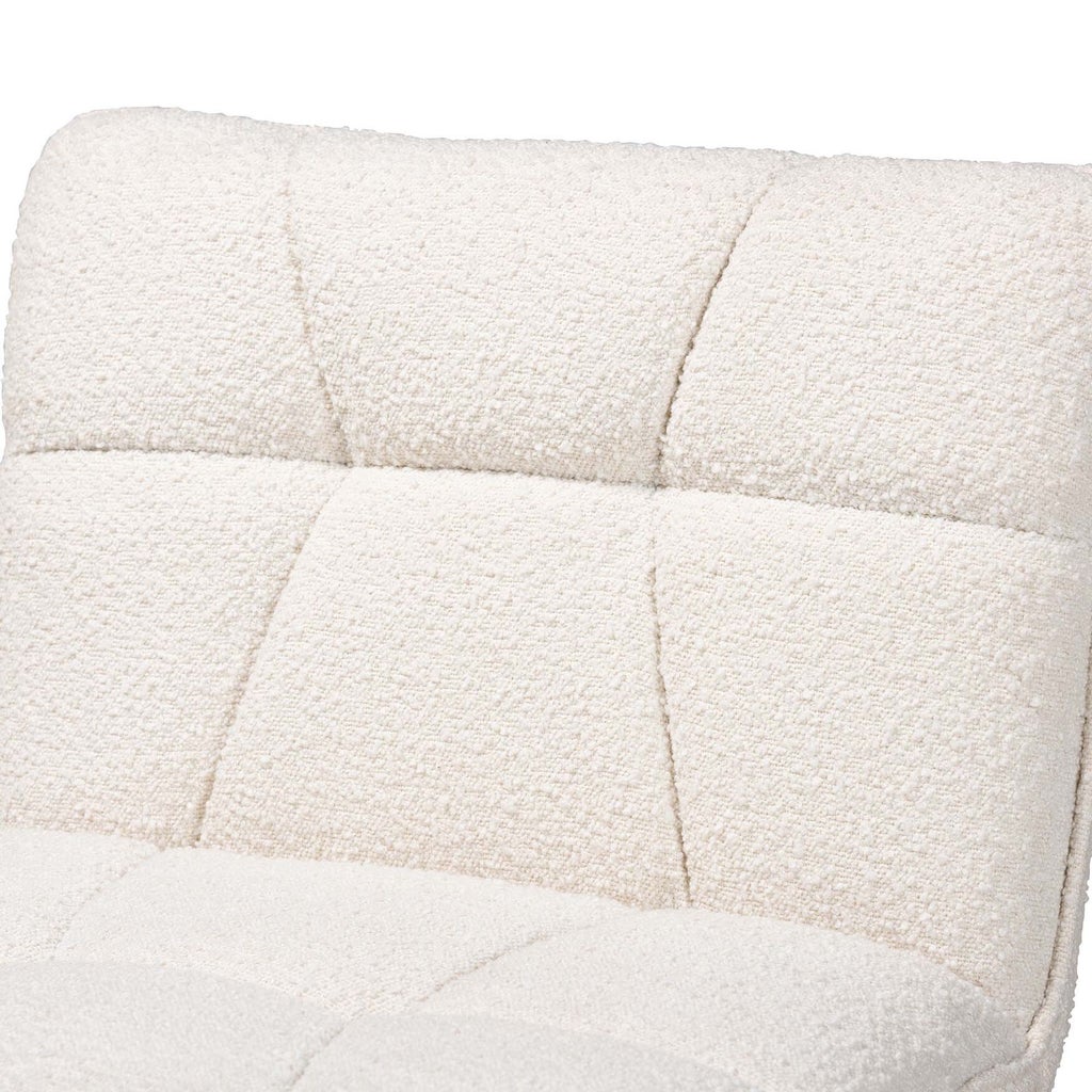 Close-up of cream boucle fabric on chair back