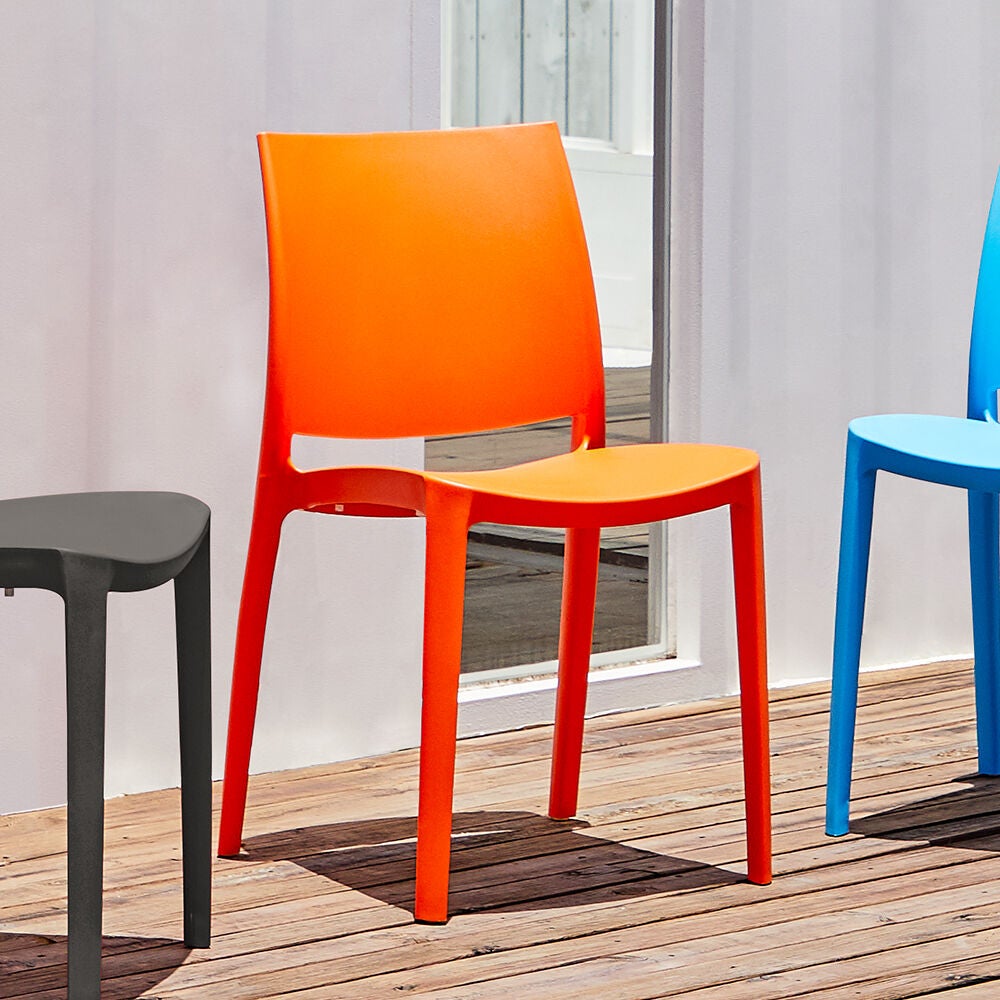 Orange stackable outdoor dining chair with molded seat and back