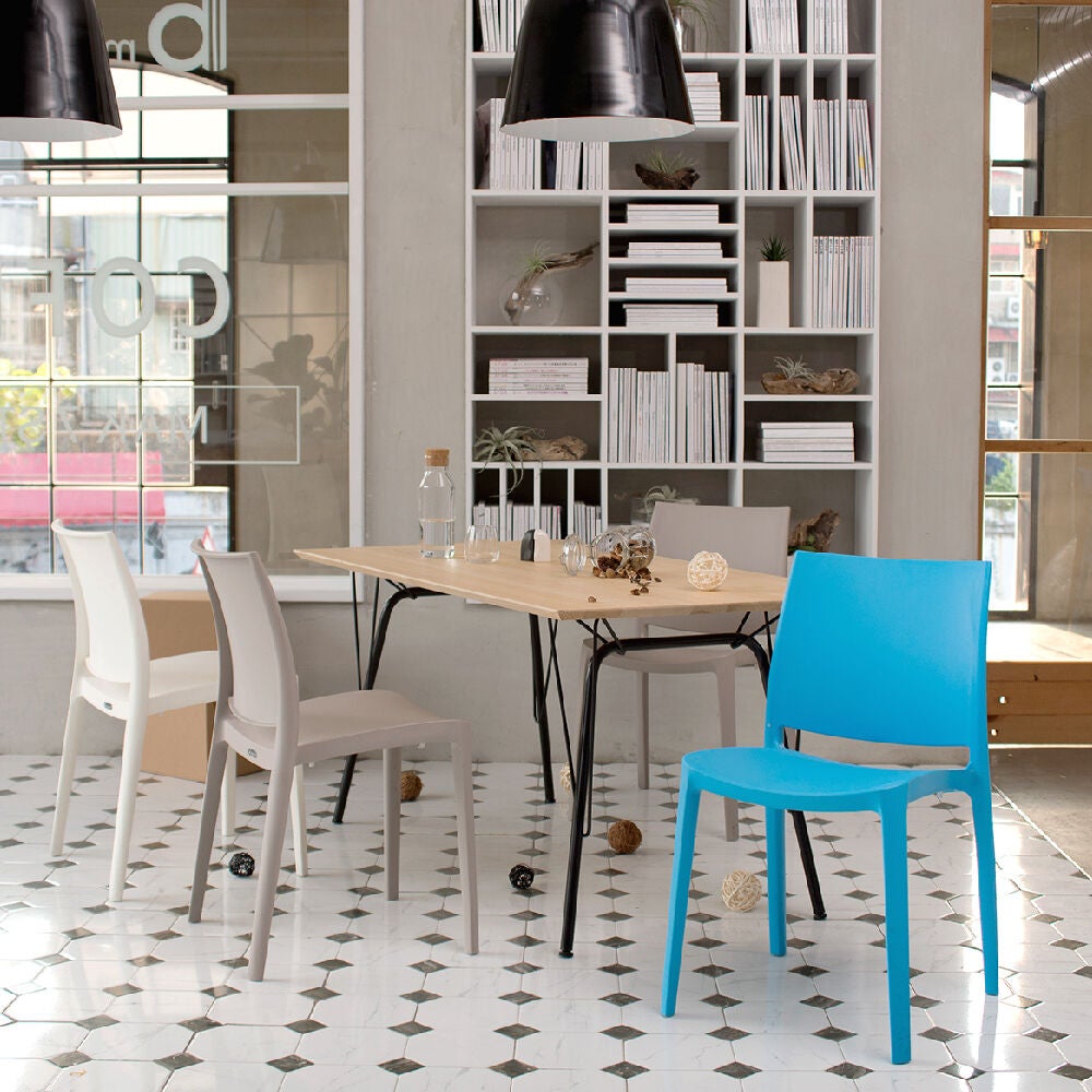 Interior dining area with multiple Sensilla chairs around a table