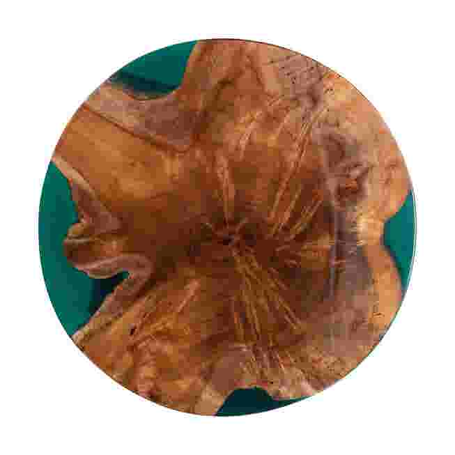 Close-up of the teak wood and green epoxy resin pattern on the end table top