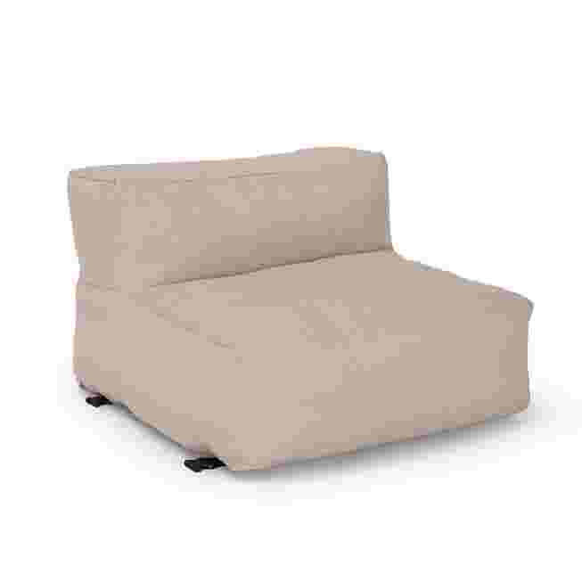 Beige modular deep seat chair with a high back and black feet.