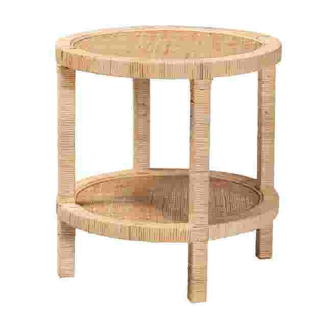 A round, two-tier end table made of natural rattan and wood, shown against a white background.