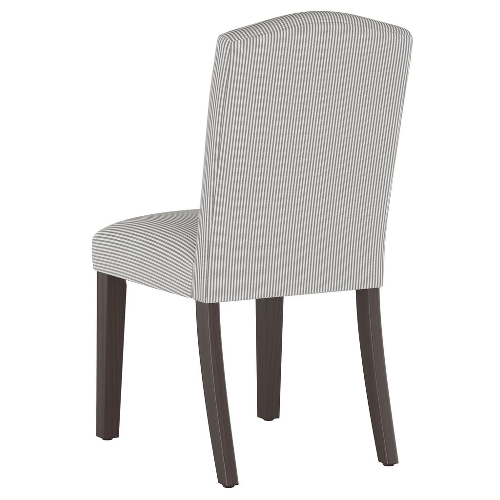 Rear three-quarter view of striped dining chair.