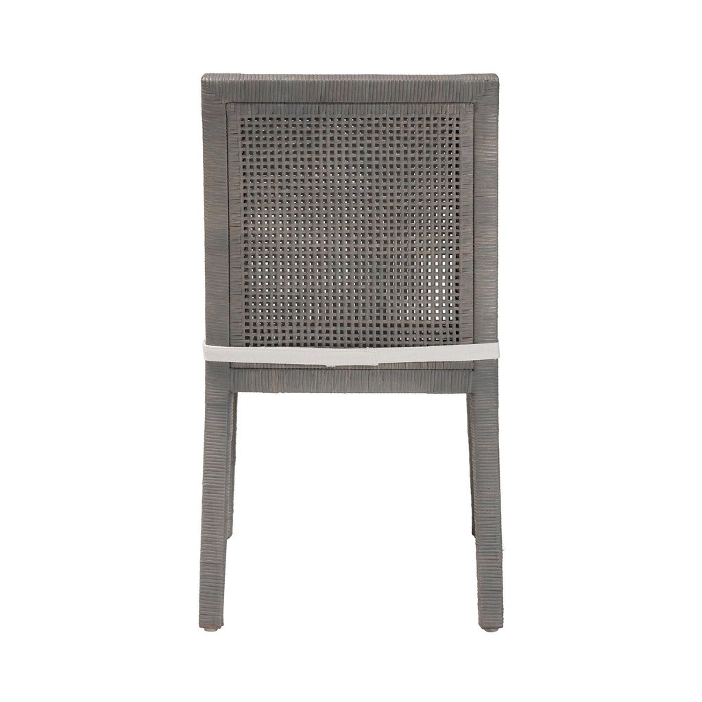 Back view of grey woven dining chair with white cushion
