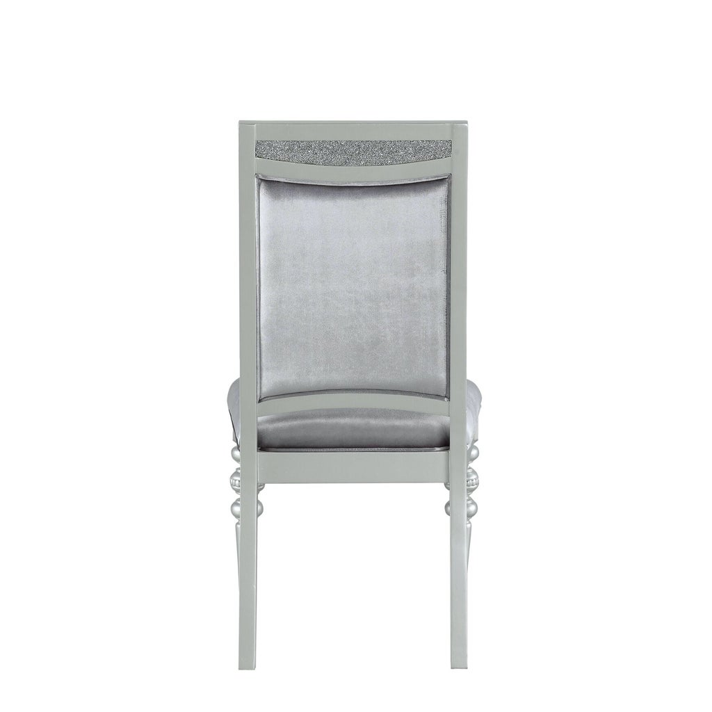 Back view of silver upholstered side chair