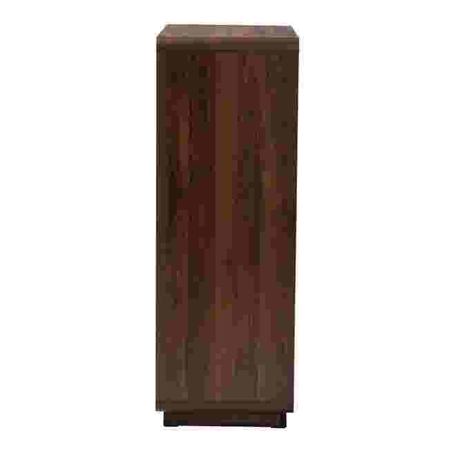 A side view of a dark wood chest with a rattan drawer front.