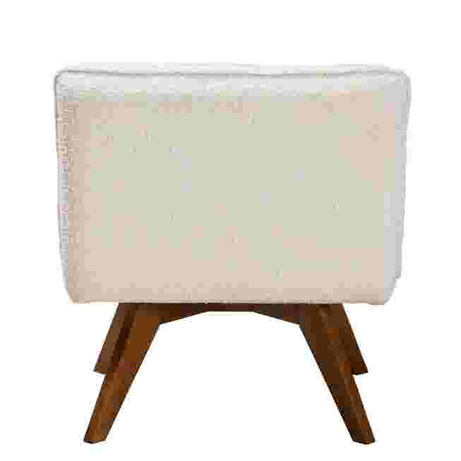 Back view of a cream boucle fabric accent chair with wooden legs