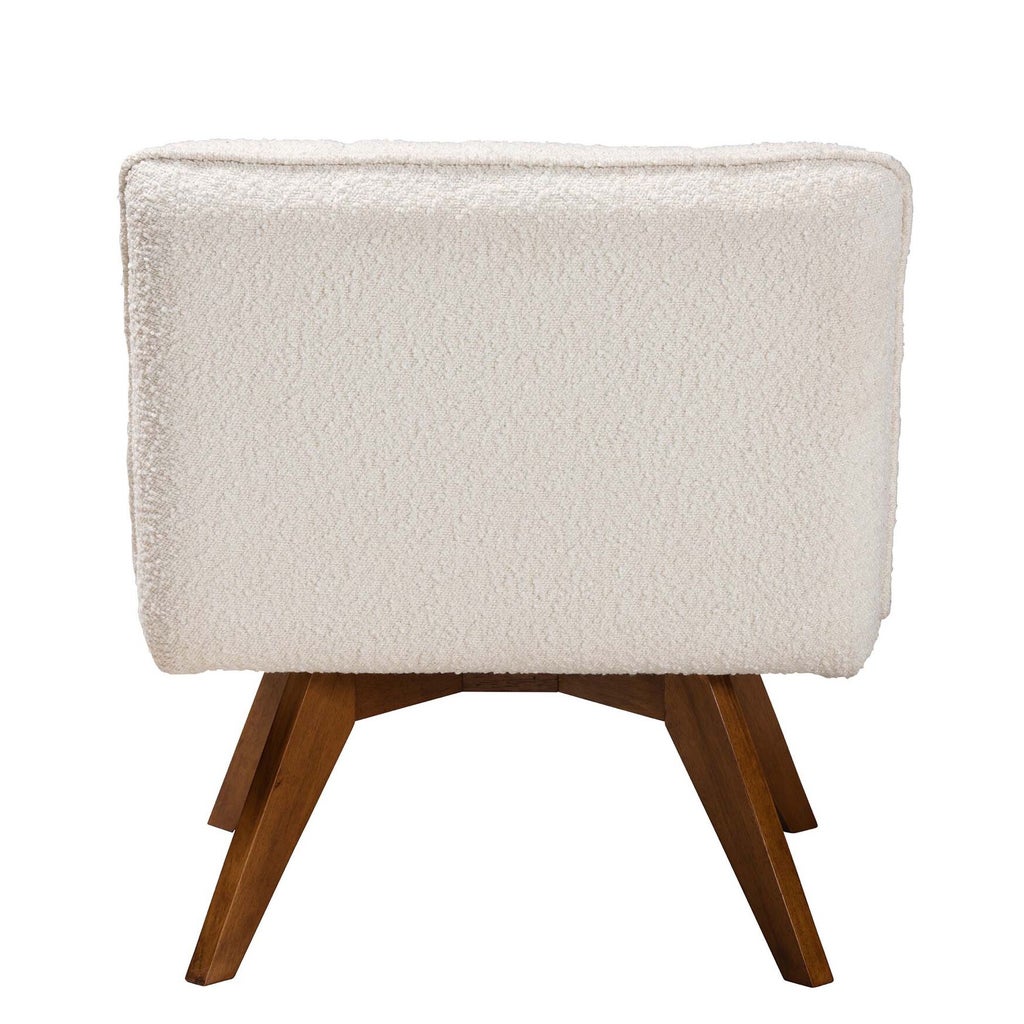 Rear view of cream boucle chair showing back and legs