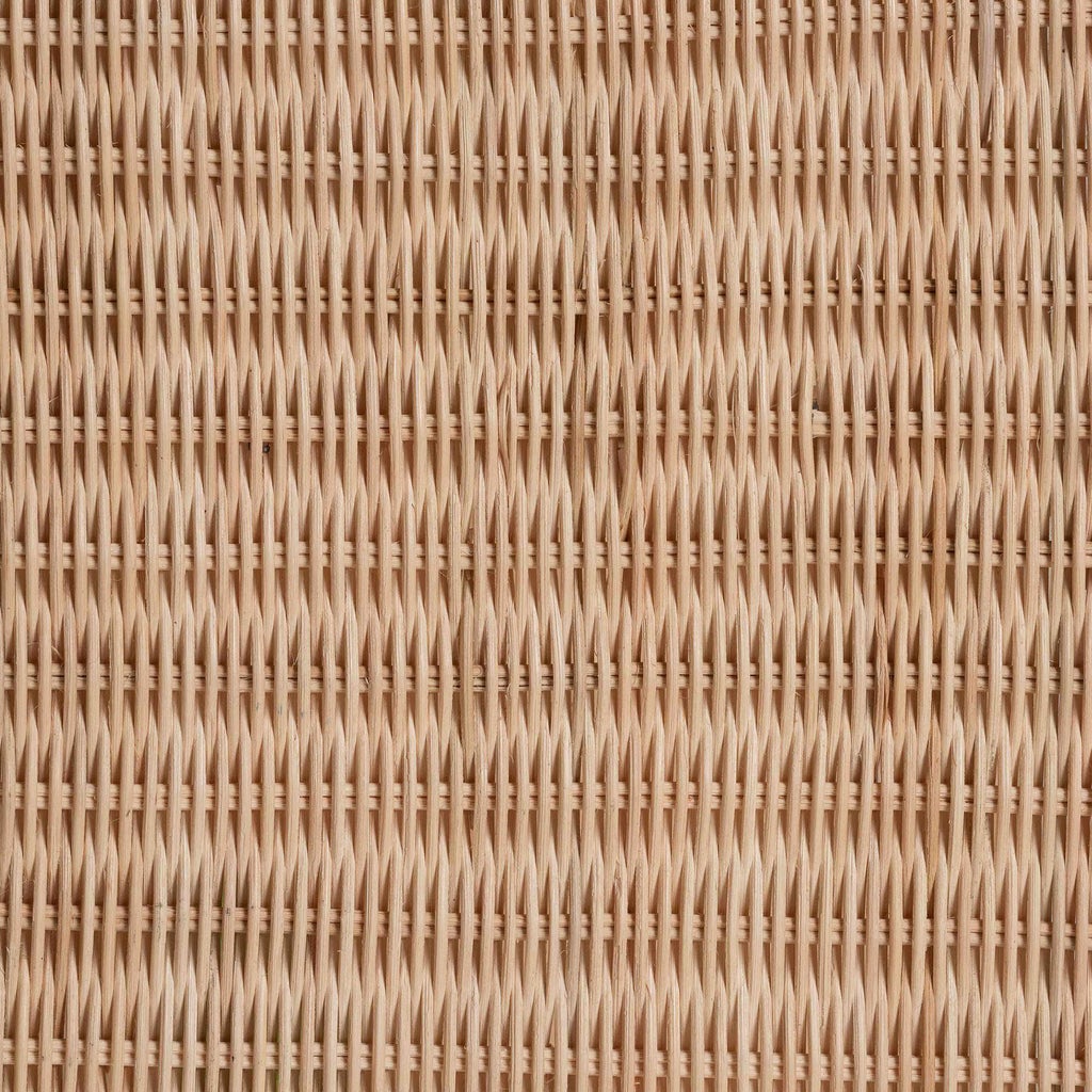 Close-up texture of natural rattan woven panel used on console table