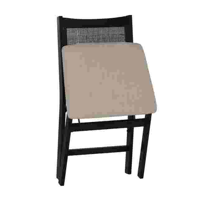 Black folding chair with a light-colored seat cushion, shown in a partially folded position.