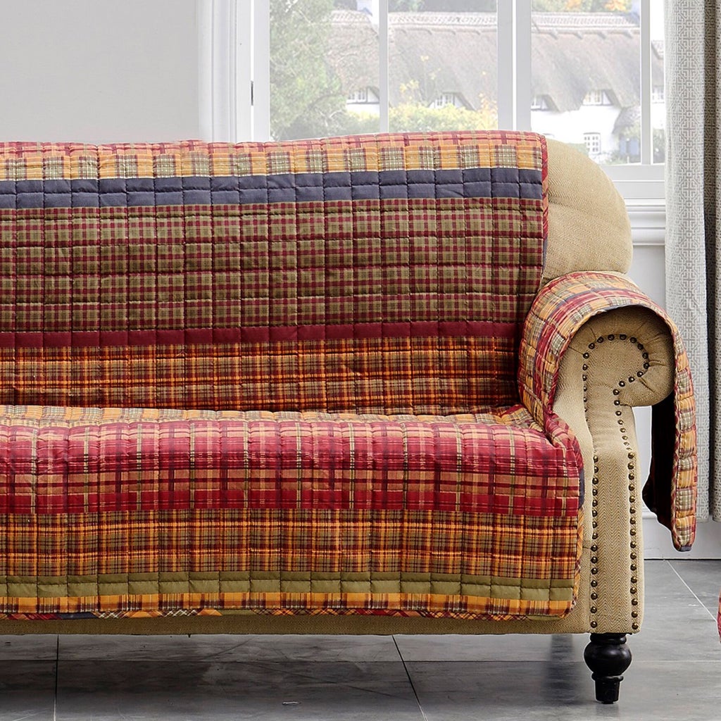 Multi-color plaid quilted protector on sofa