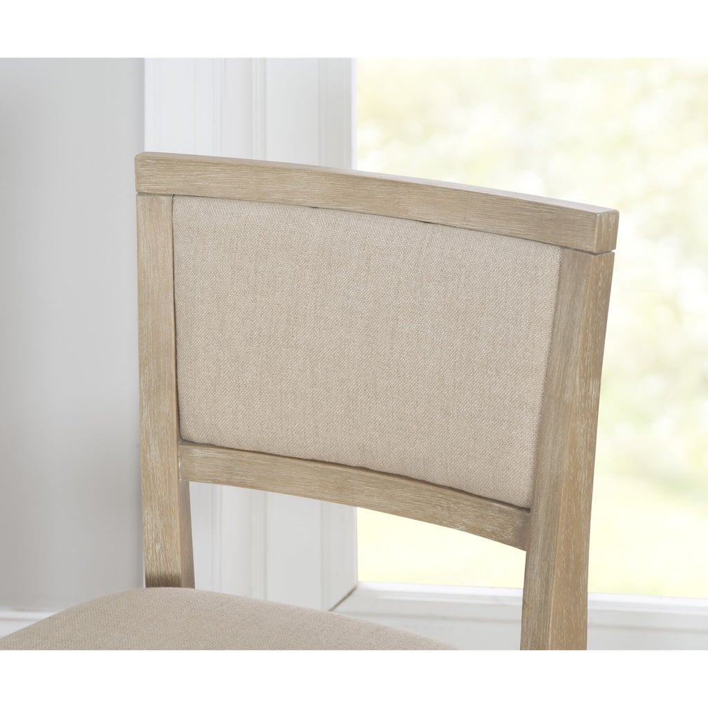 Close-up of chair back with fabric upholstered panel