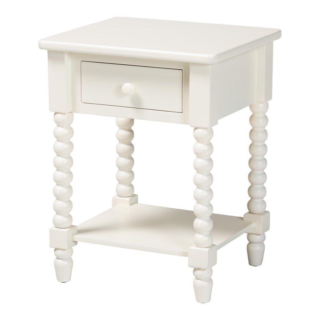 Close-up of white Raynera end table with single drawer