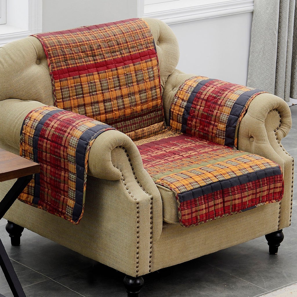 Close-up of multicolor quilted furniture protectors on arms