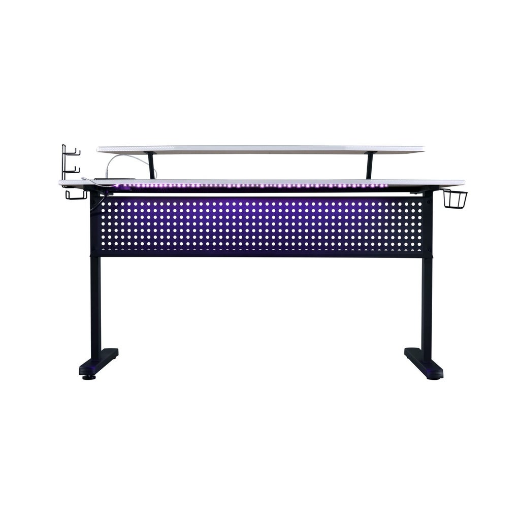 Desk with purple LED lighting under and peripheral setup