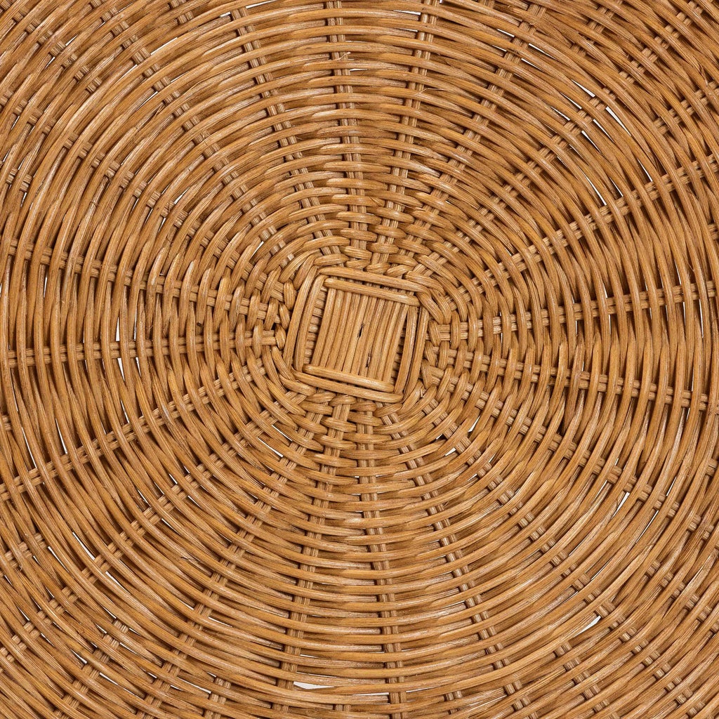 Close-up of concentric woven rattan pattern on round end table top