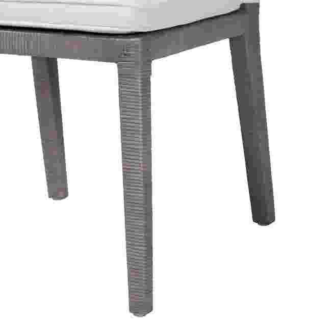 Close-up of the leg of the Sofia Natural Rattan Dining Chair