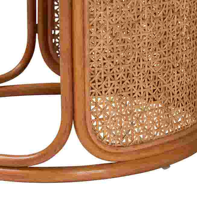 Close-up of the woven rattan pattern on the side of the end table.