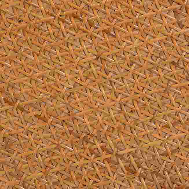 Close-up of the woven rattan texture on the side of the end table.