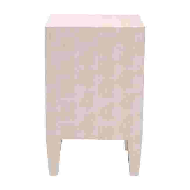 Back view of a beige faux shagreen end table with three drawers.