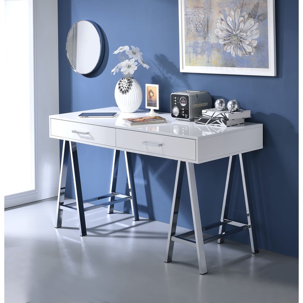 Desk against blue wall with decor