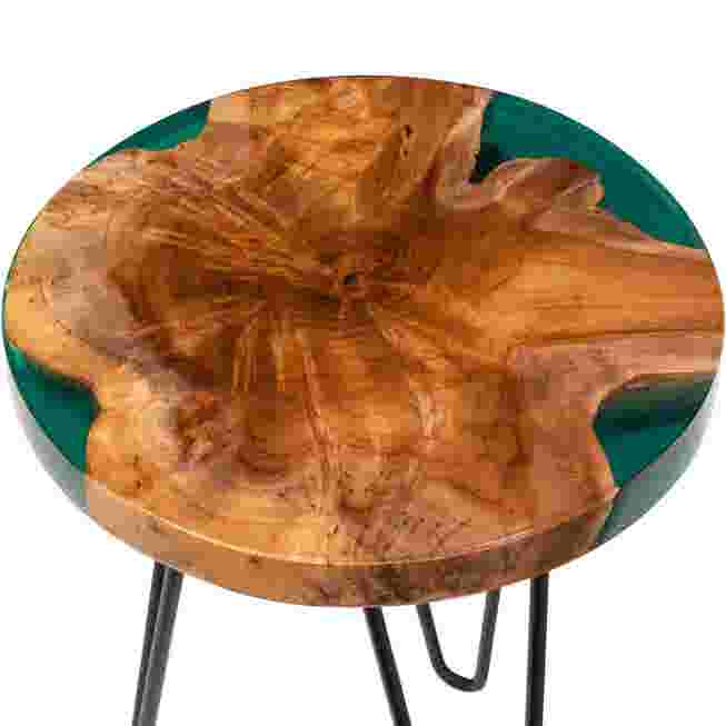Close-up of the round teak wood and epoxy resin top of the end table