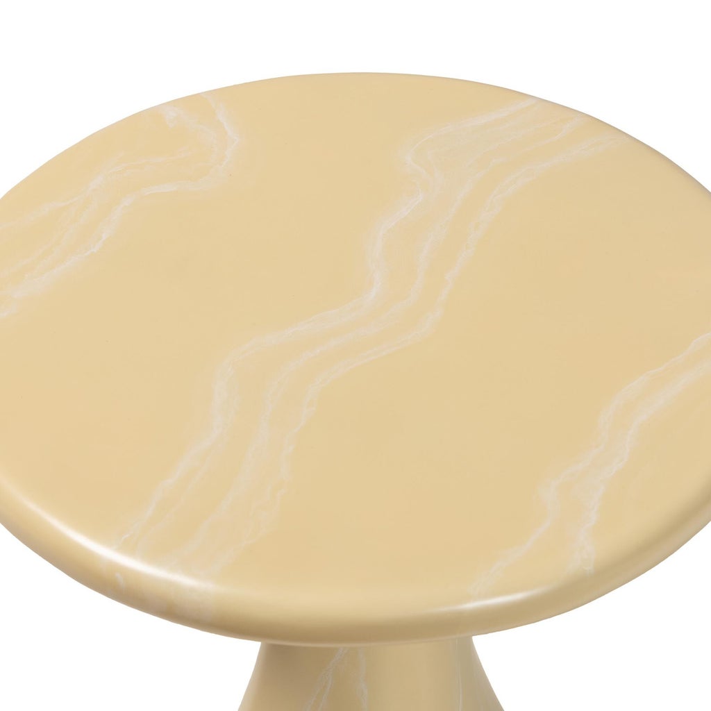 Top view of beige marble round tabletop with white veining