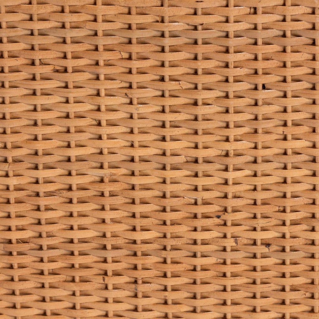 Close-up of natural rattan grid weave texture on the end table