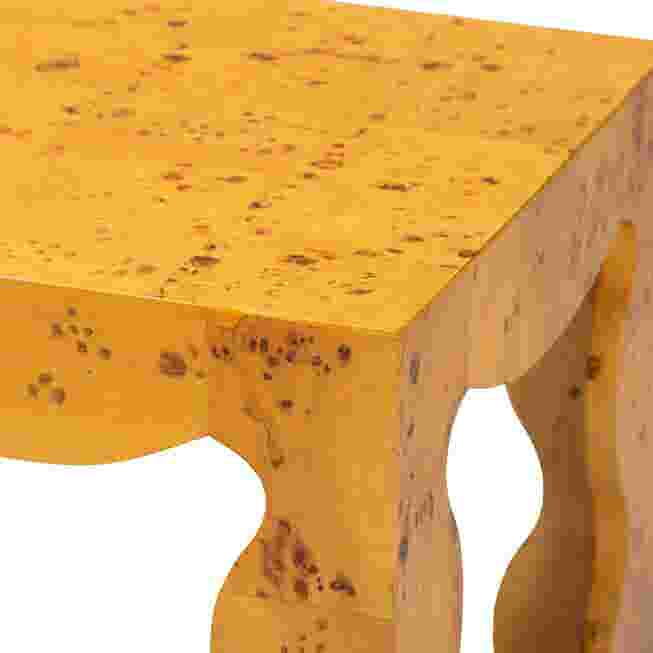 Close-up of burl wood table surface and edge