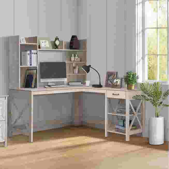 L-shaped desk with a drawer and open shelf in a light gray finish