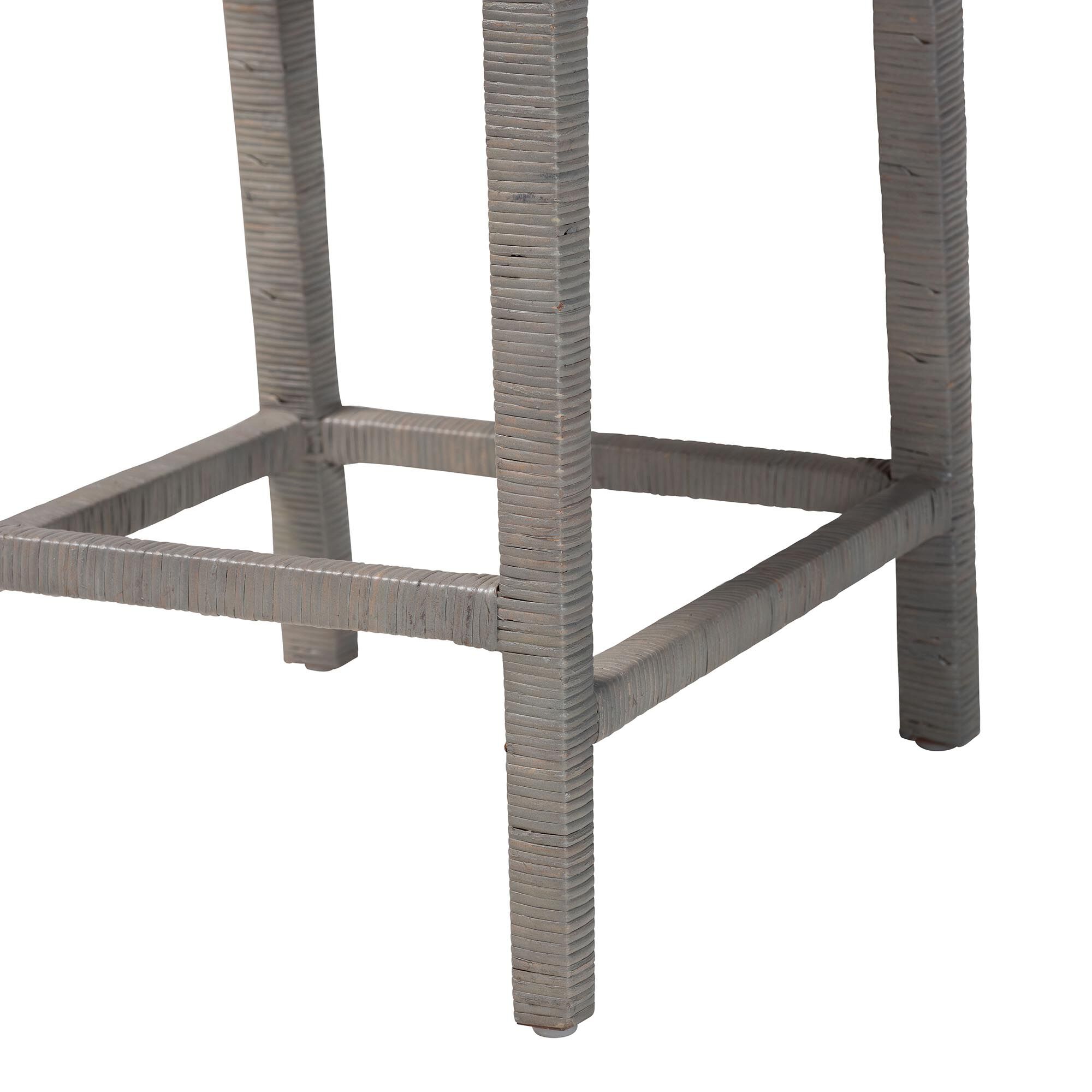 Close-up of the metal frame and leg of the Sofia Natural Rattan Counter Stool