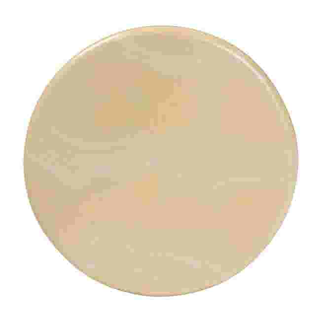 A close-up of the circular top surface of a cream-colored resin end table.
