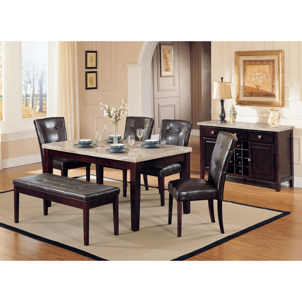 Six brown leather dining chairs around a dining table with bench