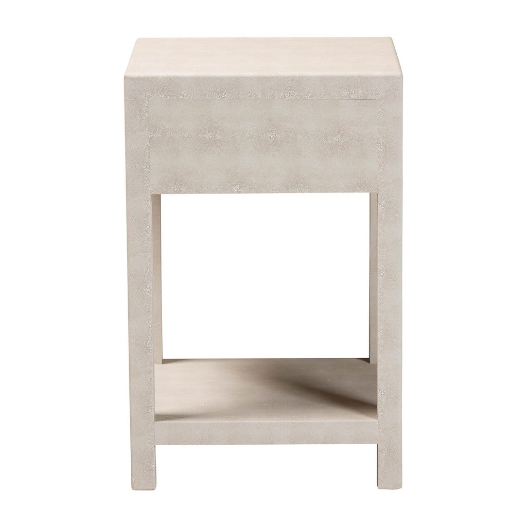 Rear/side close-up of beige faux shagreen end table surface