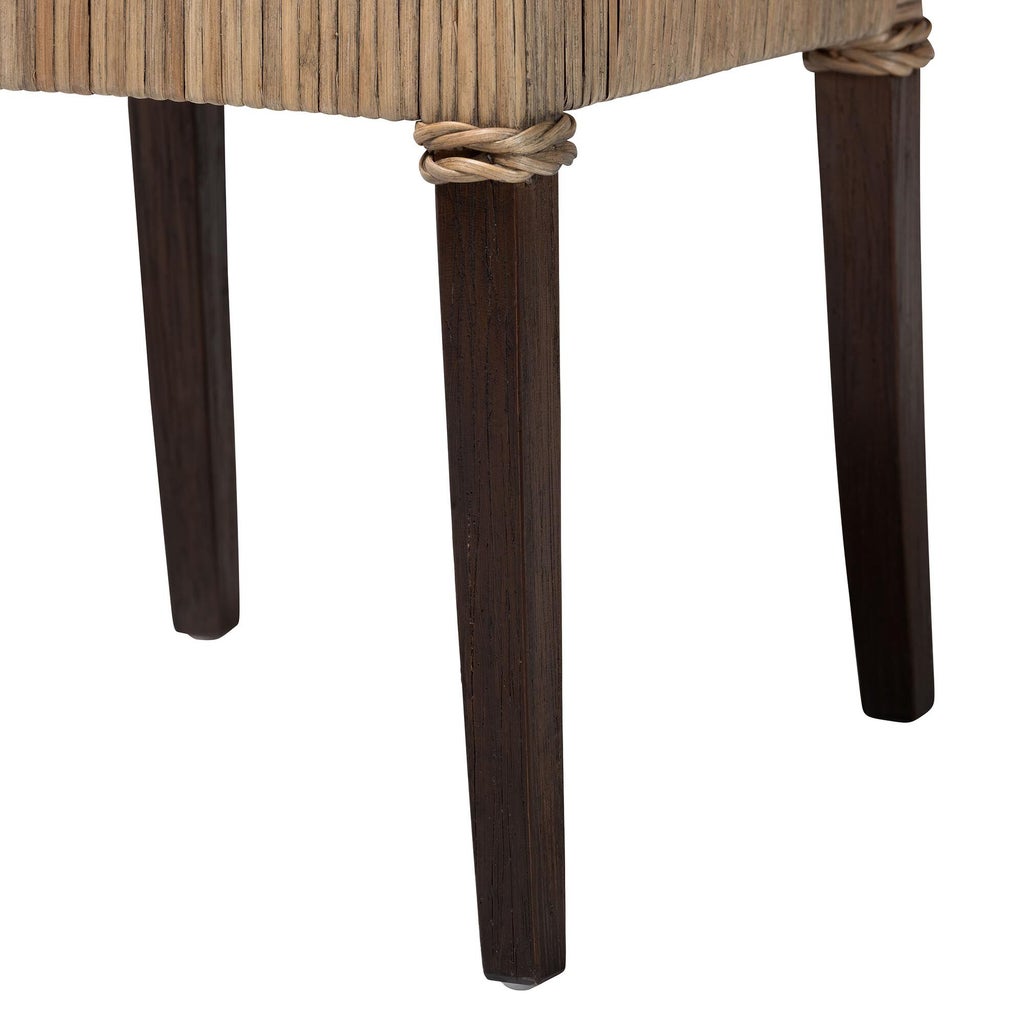 Close-up of dark legs and rattan binding on dining chair