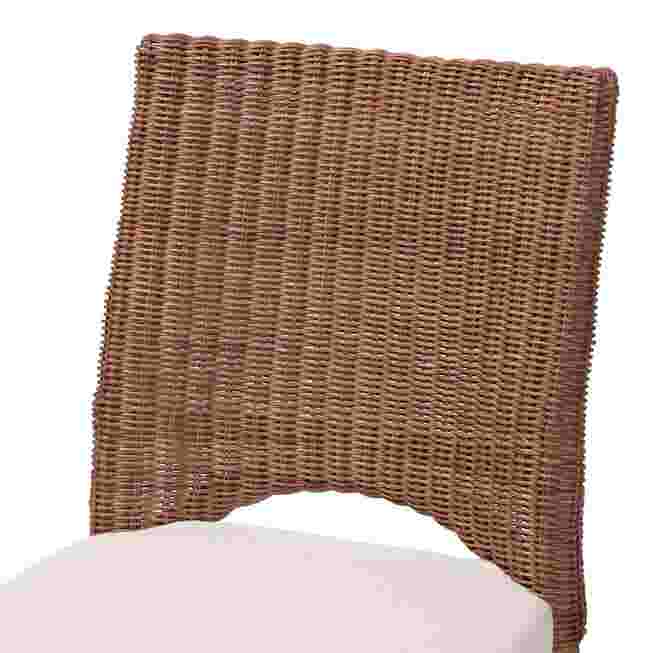 Close-up of the woven backrest of a rattan chair