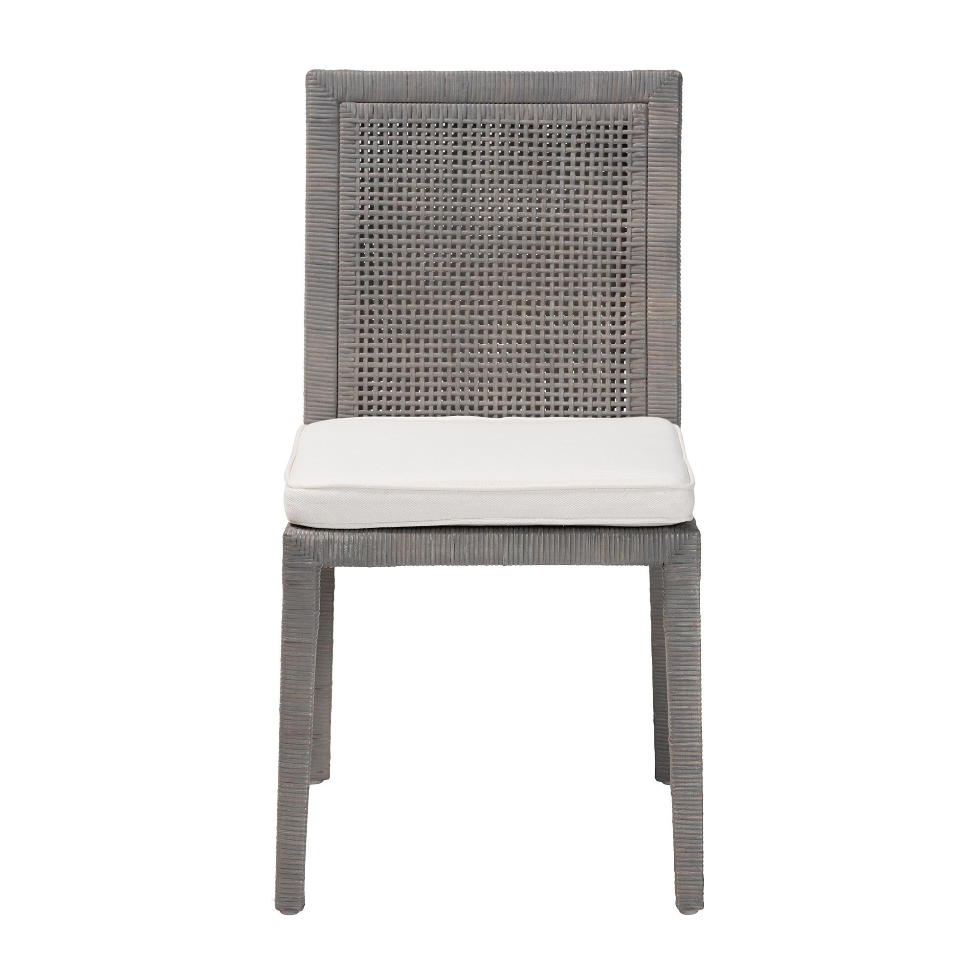 Sofia Natural Rattan Dining Chair with white cushion on a white background