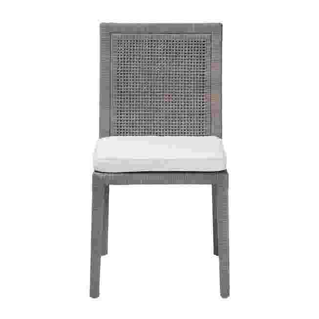 Sofia Natural Rattan Dining Chair with white cushion on a white background