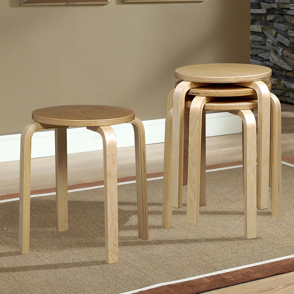 Set of four light brown bentwood stools