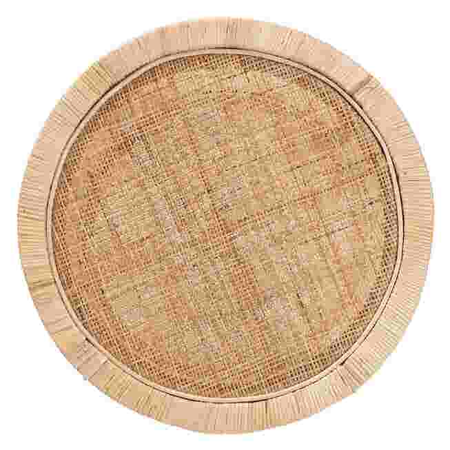 A top-down view of the round, woven surface of a two-tier end table.