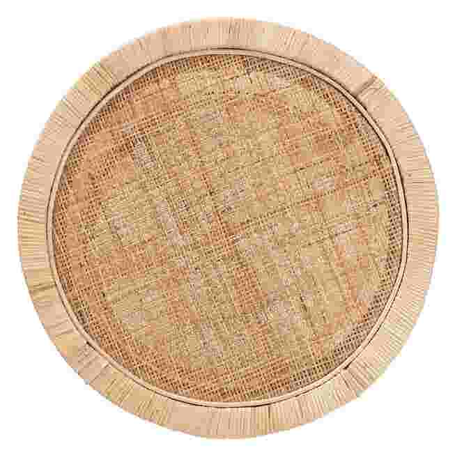 A top-down view of the round, woven surface of a two-tier end table.