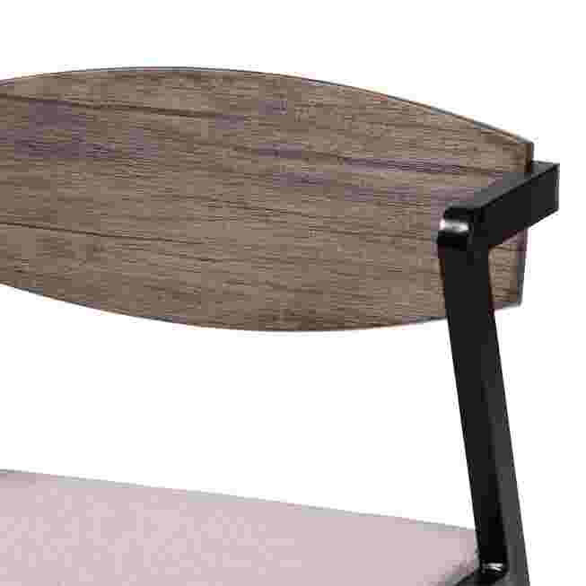 a close-up of the backrest and frame of a dining chair